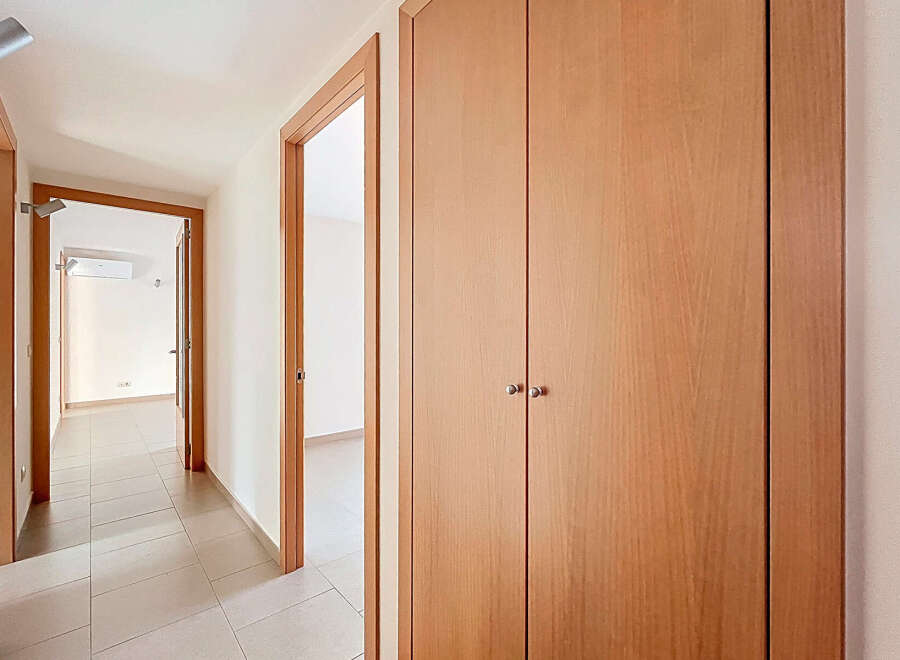 Step into this inviting hallway, showcasing a seamless blend of functionality and style.