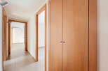 Step into this inviting hallway, showcasing a seamless blend of functionality and style.