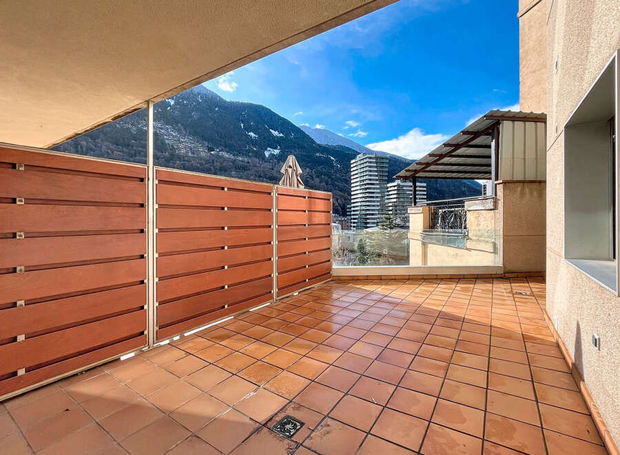 Enjoy breathtaking mountain views from this stunning balcony.