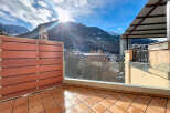 Enjoy breathtaking mountain views from this stunning balcony.