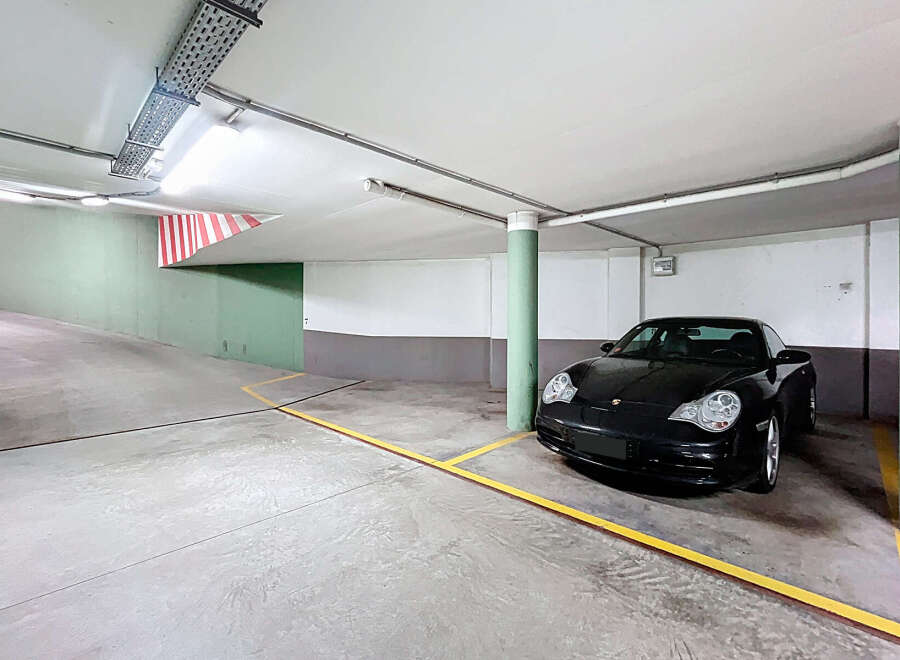 Discover the convenience of this secure parking space, perfect for protecting your vehicle.