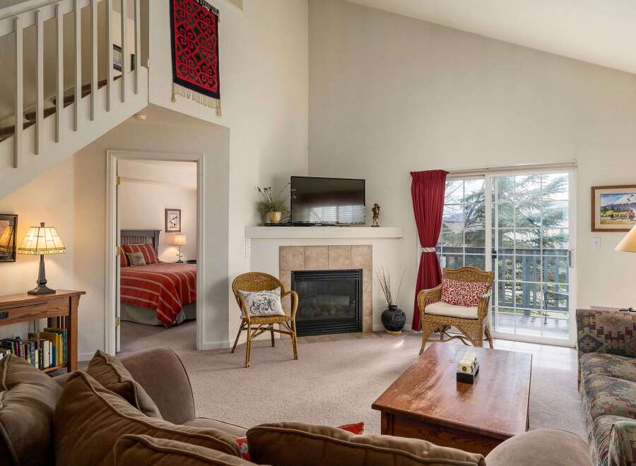 Step into this inviting living space, perfect for relaxation and entertaining.