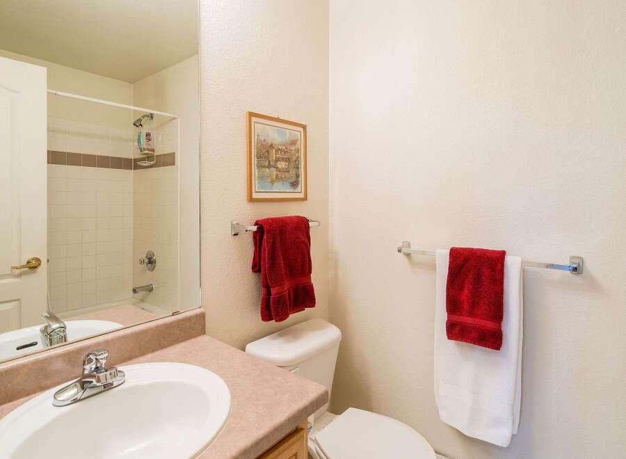 This charming bathroom features a clean and inviting space, perfect for relaxation.