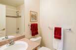 This charming bathroom features a clean and inviting space, perfect for relaxation.