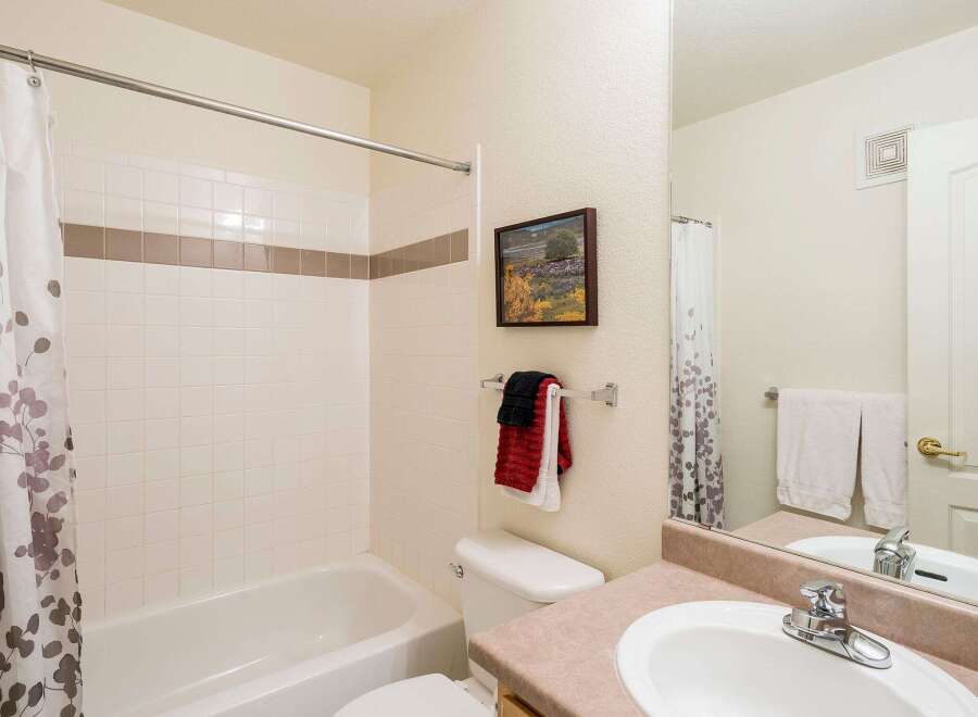 Step into this inviting bathroom, featuring a clean and bright aesthetic.