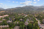Nestled in a picturesque mountain setting, this property offers a serene escape.