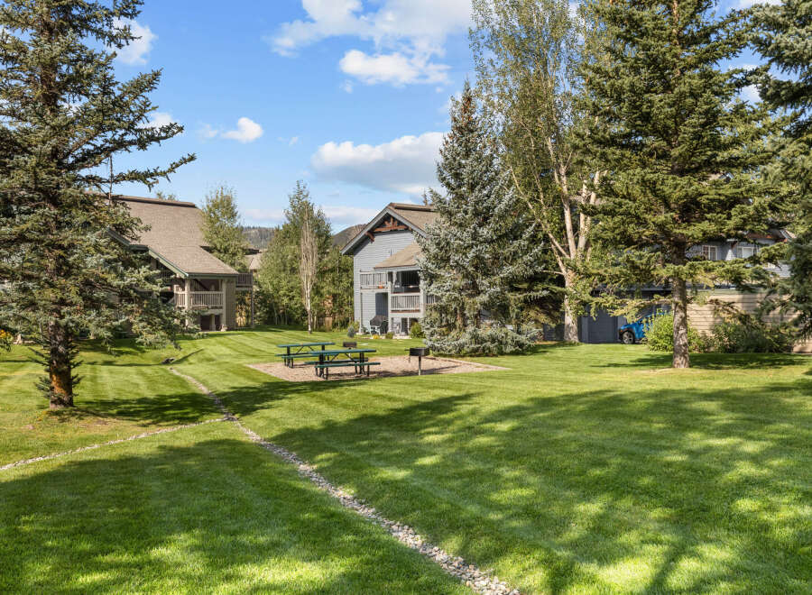 Discover the charm of this stunning property nestled in a serene, tree-lined setting.