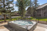 Enjoy a relaxing soak in this luxurious hot tub, perfect for unwinding after a long day.