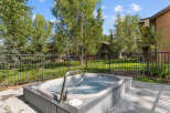 Relax and unwind in this luxurious hot tub, perfect for enjoying the beautiful outdoor scenery.