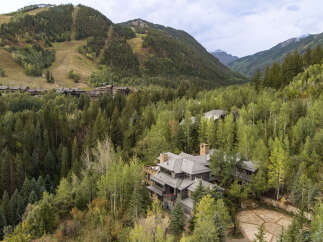 Nestled amidst the lush greenery of the mountains, this stunning property offers unparalleled privacy and tranquility.
