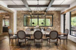 This stunning dining room showcases a blend of rustic charm and modern elegance.