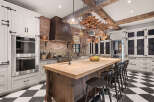 This stunning kitchen boasts a rustic yet elegant design, perfect for culinary enthusiasts.