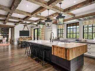 This stunning kitchen boasts a rustic yet modern design, perfect for entertaining and everyday living.