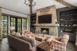 This stunning living room boasts a cozy fireplace, perfect for chilly evenings.