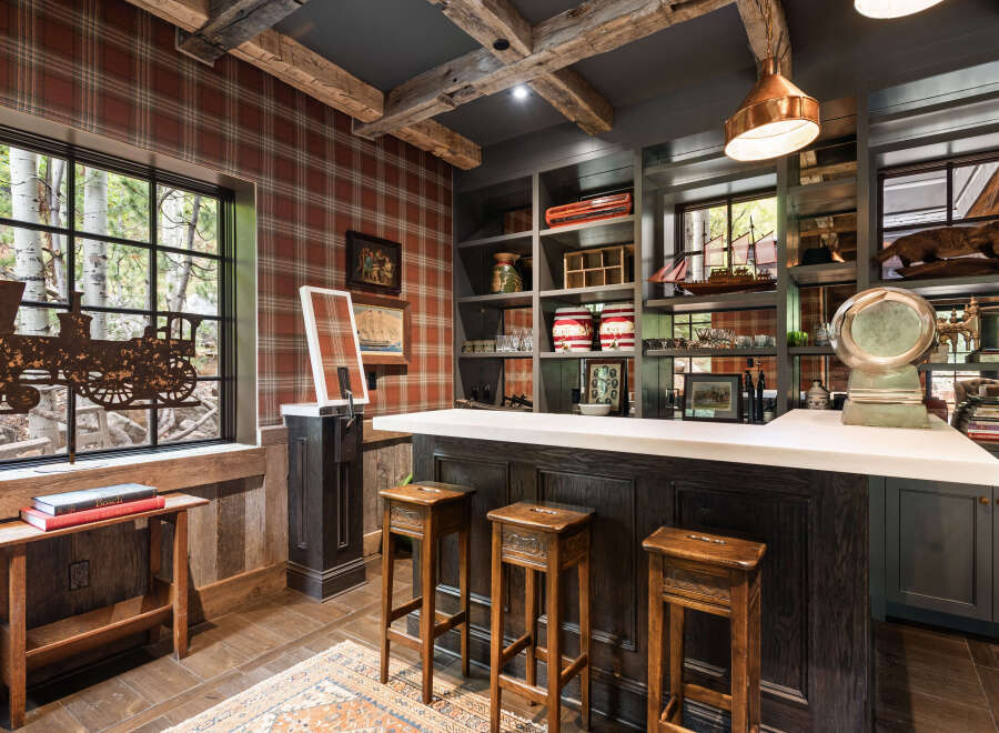 Step into luxury with this stunning bar area, perfect for entertaining guests or enjoying a quiet evening.