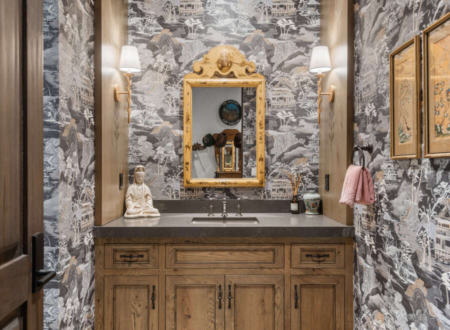 This stunning bathroom boasts a unique blend of elegance and tranquility.