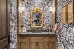 This stunning bathroom boasts a unique blend of elegance and tranquility.
