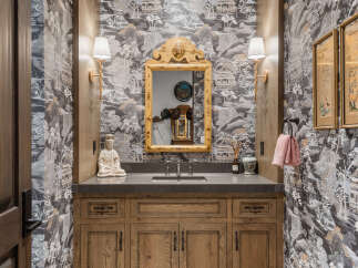 This stunning bathroom boasts a unique blend of elegance and tranquility.
