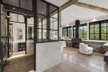 Experience luxury in this stunning bathroom featuring a modern design with a touch of rustic charm.