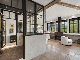 Experience luxury in this stunning bathroom featuring a modern design with a touch of rustic charm.