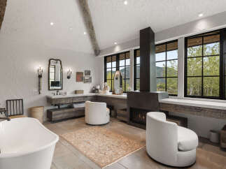 This luxurious bathroom boasts a modern design with rustic elements.