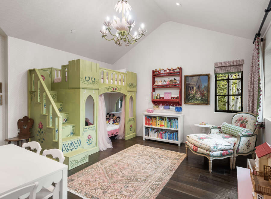 Step into a whimsical children's room, featuring a custom-built, castle-themed bunk bed that sparks imagination.