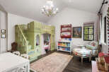 Step into a whimsical children's room, featuring a custom-built, castle-themed bunk bed that sparks imagination.
