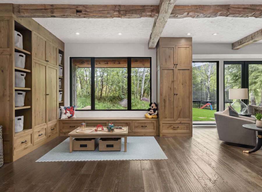 This stunning property boasts a beautifully designed playroom, perfect for families.