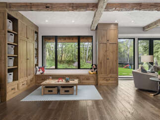This stunning property boasts a beautifully designed playroom, perfect for families.