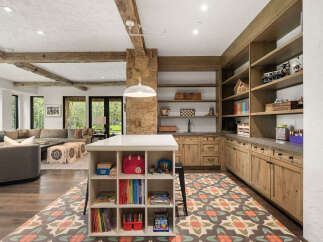 This stunning property boasts a spacious and inviting interior, perfect for families and entertaining.