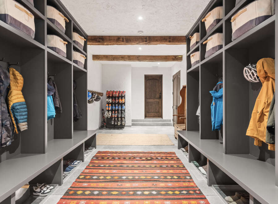 Step into this stunning entryway, designed with both style and functionality in mind.