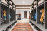 Step into this stunning entryway, designed with both style and functionality in mind.