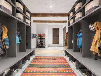 Step into this stunning entryway, designed with both style and functionality in mind.