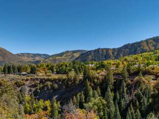 Nestled amidst the breathtaking beauty of the mountains, this property offers unparalleled views and a serene escape.