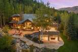 This stunning mountain estate boasts luxurious living with breathtaking views.
