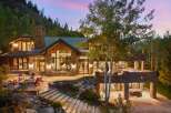 This stunning mountain home boasts exquisite architecture and design, perfect for luxurious living.