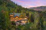 Nestled in a serene, wooded landscape, this stunning property offers unparalleled privacy and breathtaking views.