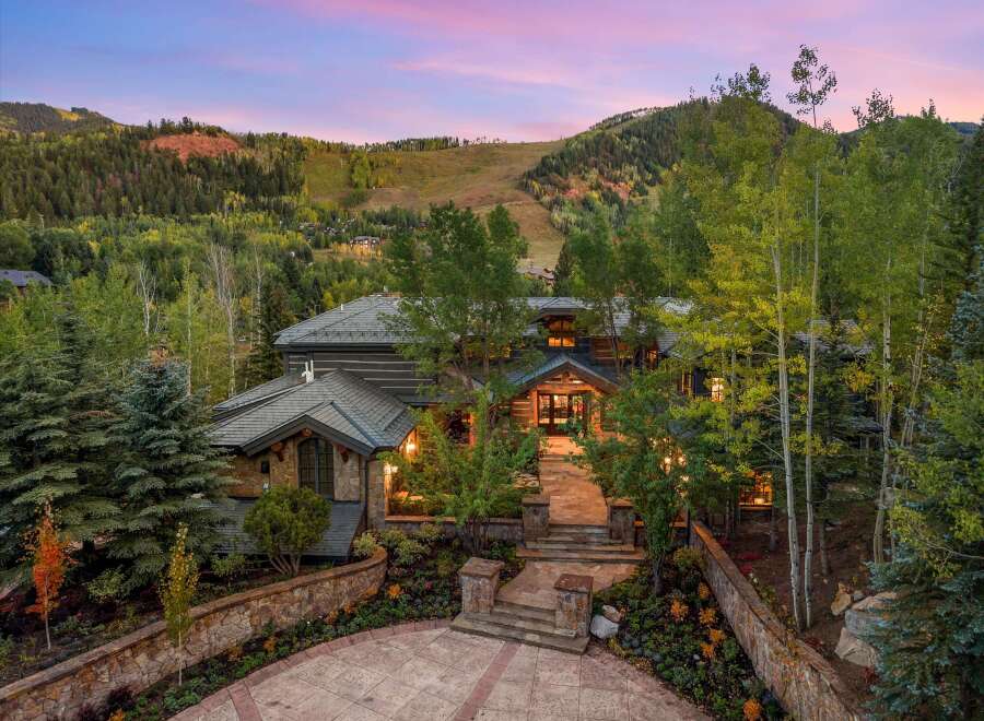 Nestled in a serene mountain landscape, this stunning property offers unparalleled luxury and privacy.