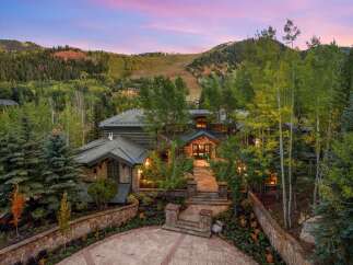 Nestled in a serene mountain landscape, this stunning property offers unparalleled luxury and privacy.