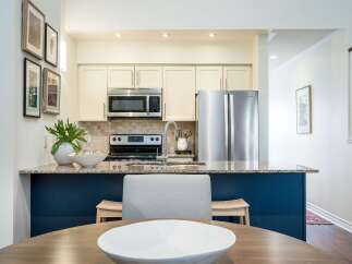 This stunning kitchen boasts modern design and functionality, perfect for culinary enthusiasts.
