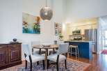 This stunning property boasts a modern kitchen with stainless steel appliances and a stylish island.
