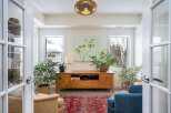 Step into a bright and inviting sunroom, perfect for relaxation and enjoying natural light.
