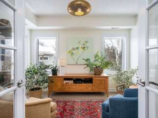 Step into a bright and inviting sunroom, perfect for relaxation and enjoying natural light.