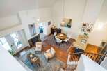 This stunning property boasts a spacious, open-concept living area with soaring ceilings and abundant natural light.