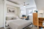 Discover the perfect blend of comfort and functionality in this stylish bedroom.