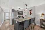 This stunning kitchen features modern design elements and high-end appliances.
