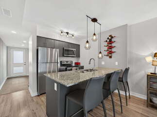 This stunning kitchen features modern design elements and high-end appliances.