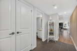 Step into this beautifully designed home and be captivated by its elegant hallway.