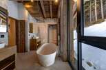 Experience luxury and tranquility in this stunning bathroom.