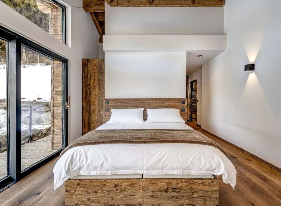 Experience rustic elegance in this stunning bedroom.
